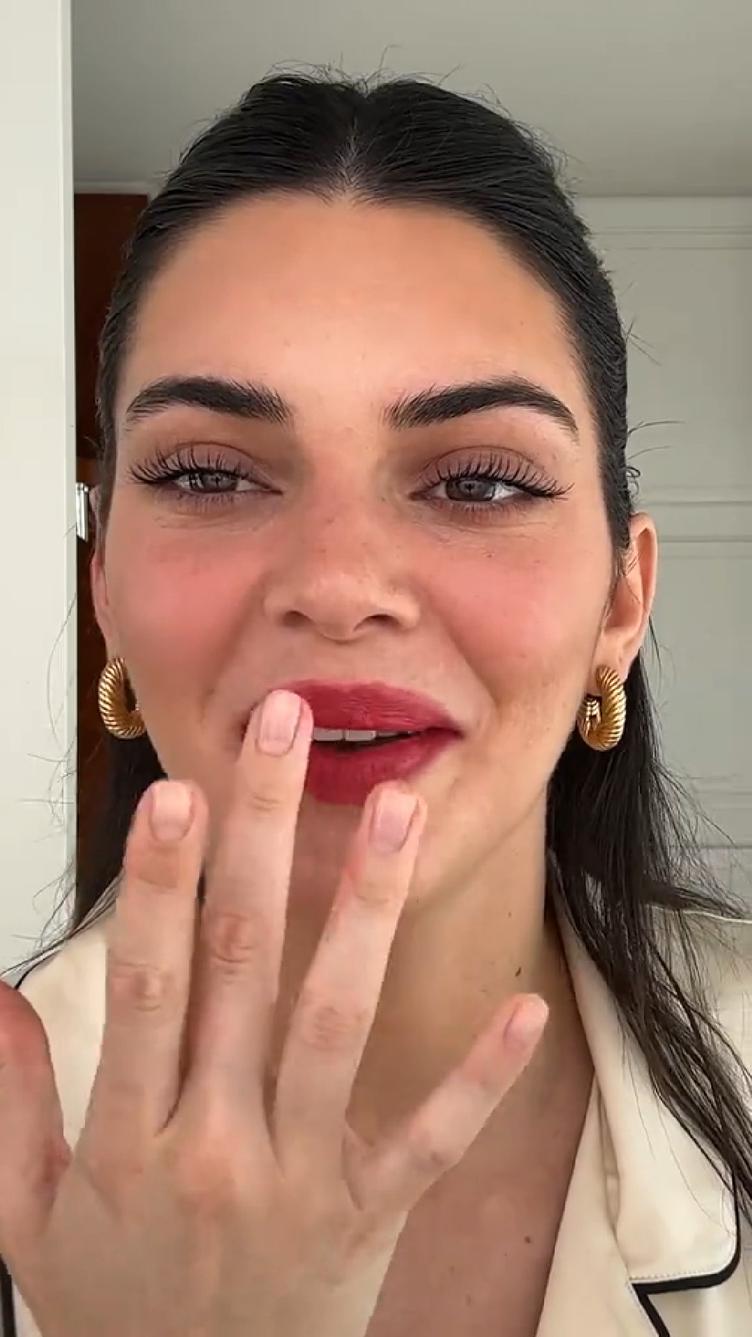 Kendall Jenner gold hoop earrings
